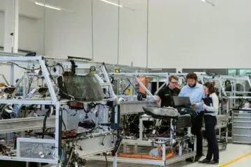 IT Professional Monitoring Manufacturing Systems